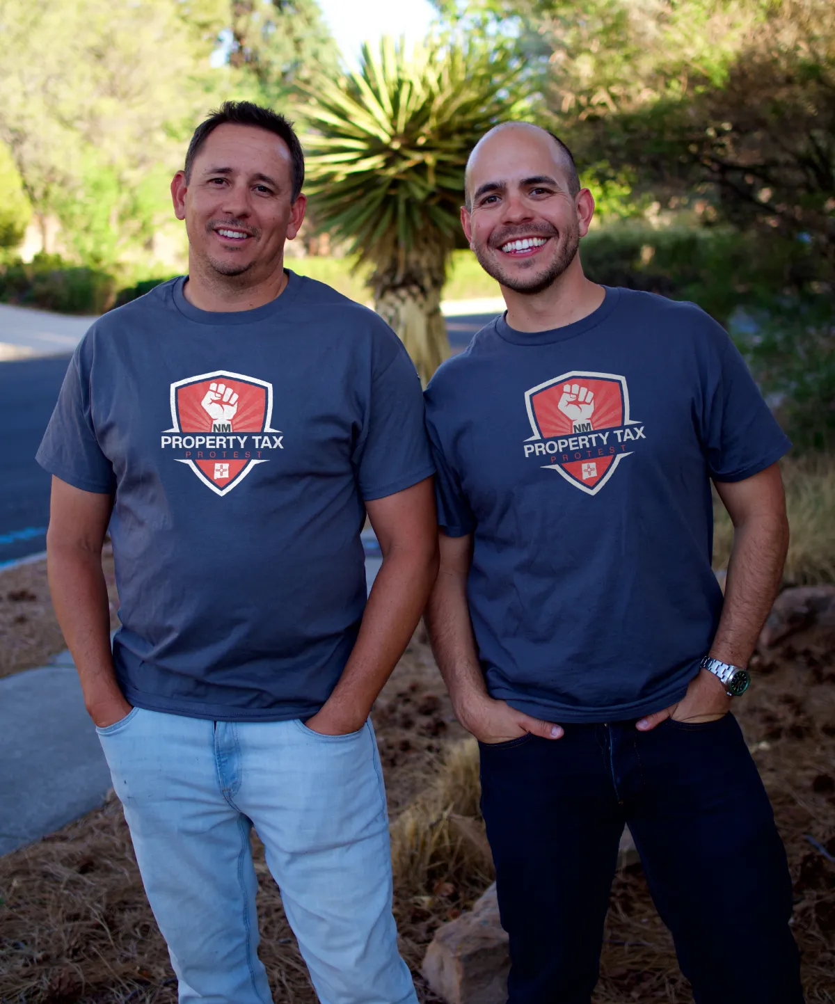 Peter and Isaac, co-founders of NM Property Tax Protest, standing together in Albuquerque, NM
